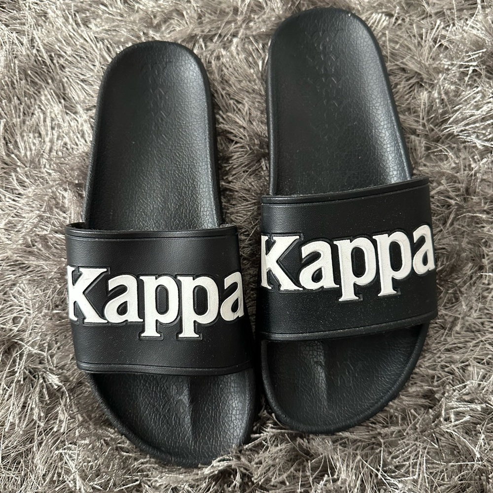 Kappa Black and White Logo Slides